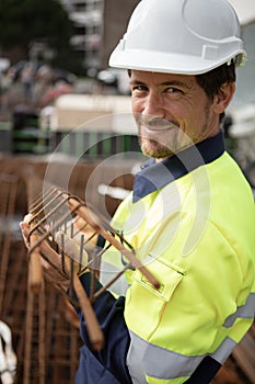 male builder making building foundations