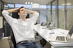 Male business desk breather laying