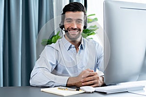 Male call center operator or telesales agent portrait. fervent