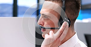 Male call centre operator doing his job