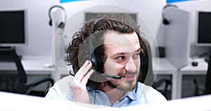 Male call centre operator doing his job