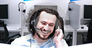 Male call centre operator doing his job