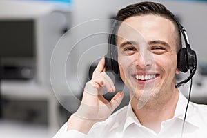 Male call centre operator doing his job