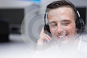 Male call centre operator doing his job
