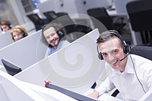 Male call centre operator doing his job