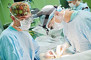 Male cardiac surgeon at child cardiosurgery operating room