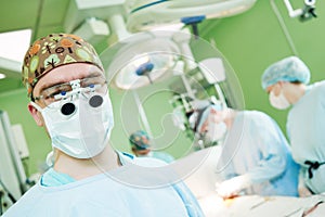 Male cardiac surgeon at child cardiosurgery operating room