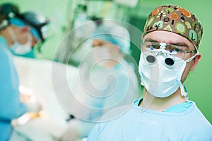 Male cardiac surgeon at child cardiosurgery operating room