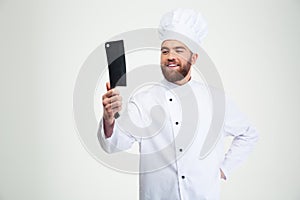 Male chef cook holding big knife cleaver