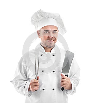 Male chef with kitchen utensils on white background