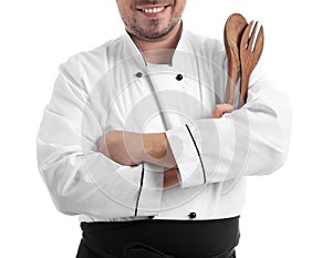 Male chef with kitchen utensils on white background, closeup