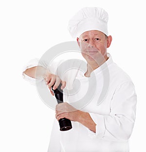 Male chef with pepper grinder