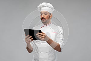 male chef with tablet pc computer