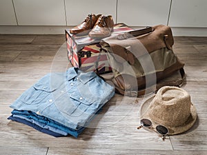 Male clothing and accessories on the wooden background photo