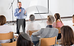 Male coach giving presentation