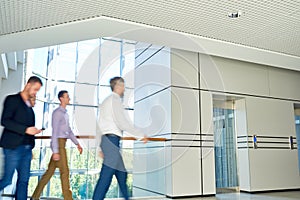 Male Colleague at Office Corridor