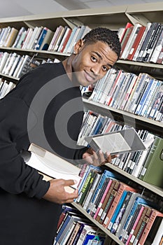 Male College Student At Library