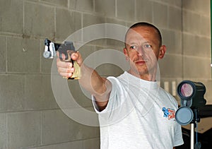 Male competitor at shooting range