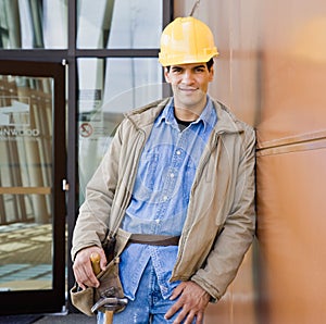 Male construction worker posing in hard-hat