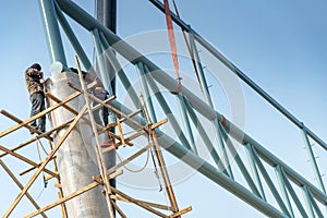 Male construction workers working at site