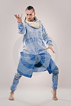 Male contemporary hip hop dancer in denim