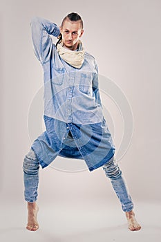 Male contemporary hip hop dancer in denim