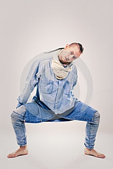 Male contemporary hip hop dancer in denim