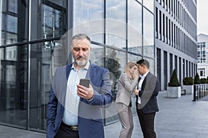 Male Coworkers employees man and woman Whispering Behind Back.