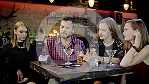 Male Customer paying with a credit card in a pub