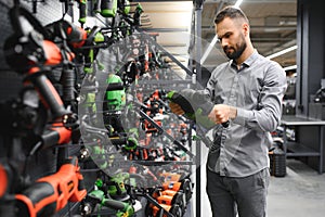 male customer in a power tool store