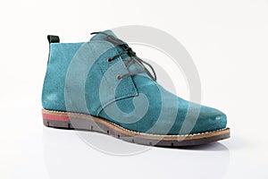 Male cyan leather boot on white background, isolated product.