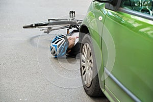 Male cyclist after road accident