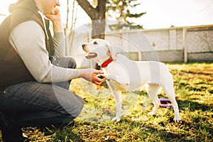 Male cynologist with trained working dog