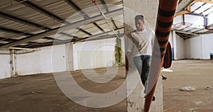 Male dancer in an empty warehouse