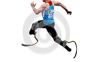 male determined athlete with prosthetic legs running