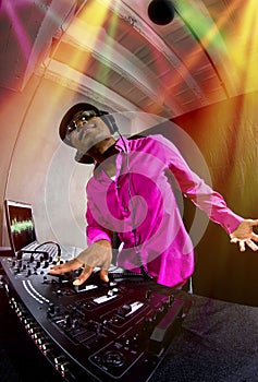 Male DJ playing Electronic Music