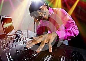 Male DJ playing Electronic Music
