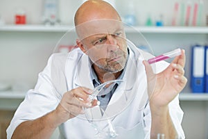 male doctor analyzing sample