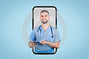 Male doctor in blue with stethoscope holding tablet in phone screen, blue background