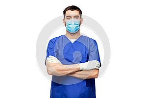 male doctor in blue uniform, mask and gloves