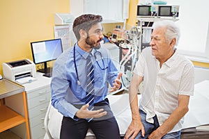 Male doctor examining a patient