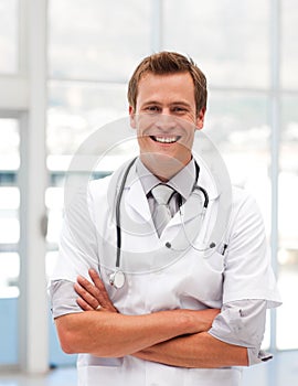 Male Doctor with Folded arms looking at camera