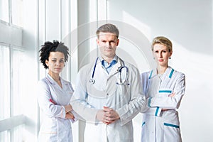 Male doctor in front of his medical team