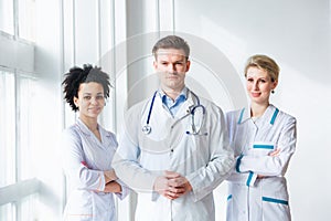 Male doctor in front of his medical team