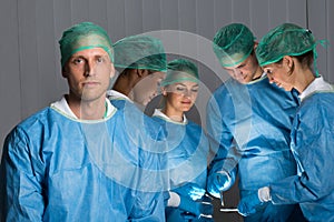 Male Doctor In Front Of His Team