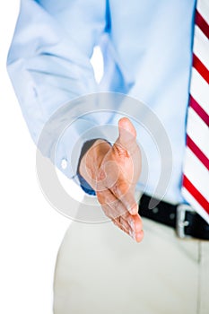 Male doctor giving his hand for a handshake