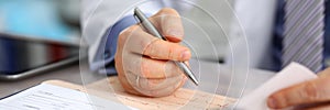 Male doctor hands with cardiogram chart