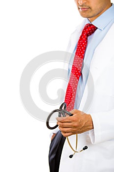 Male doctor holding a stethoscope bringing bad news patient