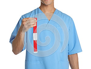 Male doctor holding tourniquet on white background, closeup.