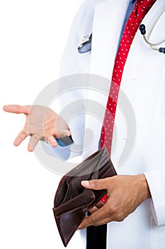 Male doctor holding a wallet and pulling out a card